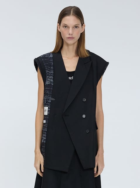 Over-fit reverse vest